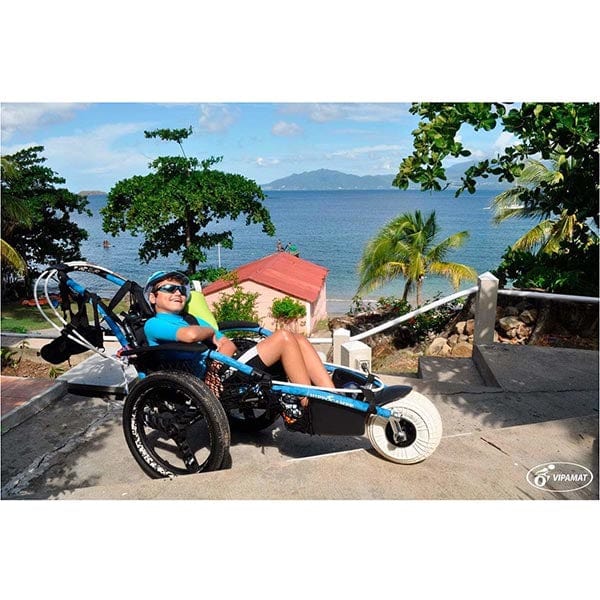 VipaMat Hippocampe Beach All-terrain Wheelchair- with person using product/ climbing stairs position