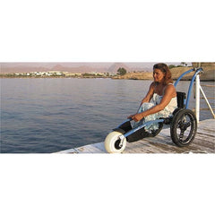 VipaMat Hippocampe Beach All-terrain Wheelchair- with person using product with beach background